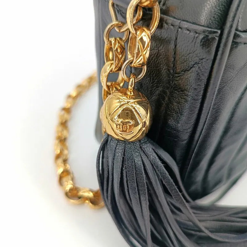 js390-chanel-vintage-black-lambskin-tassels-gold-chain-camera-bag