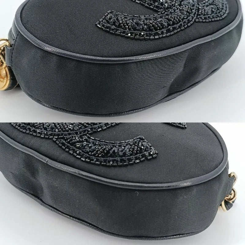 js561-chanel-vintage-black-satin-oval-camera-bag