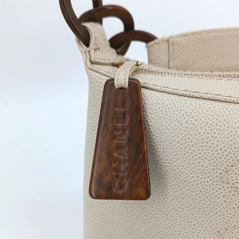 ra467-chanel-vintage-beige-caviar-leather-wood-chain-handbag