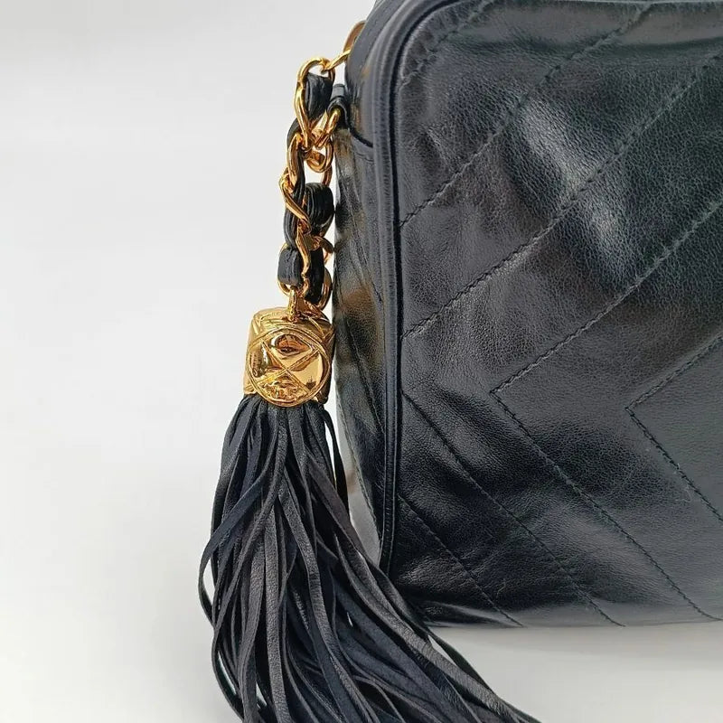 jt189-chanel-vintage-black-lambskin-tassel-camera-bag