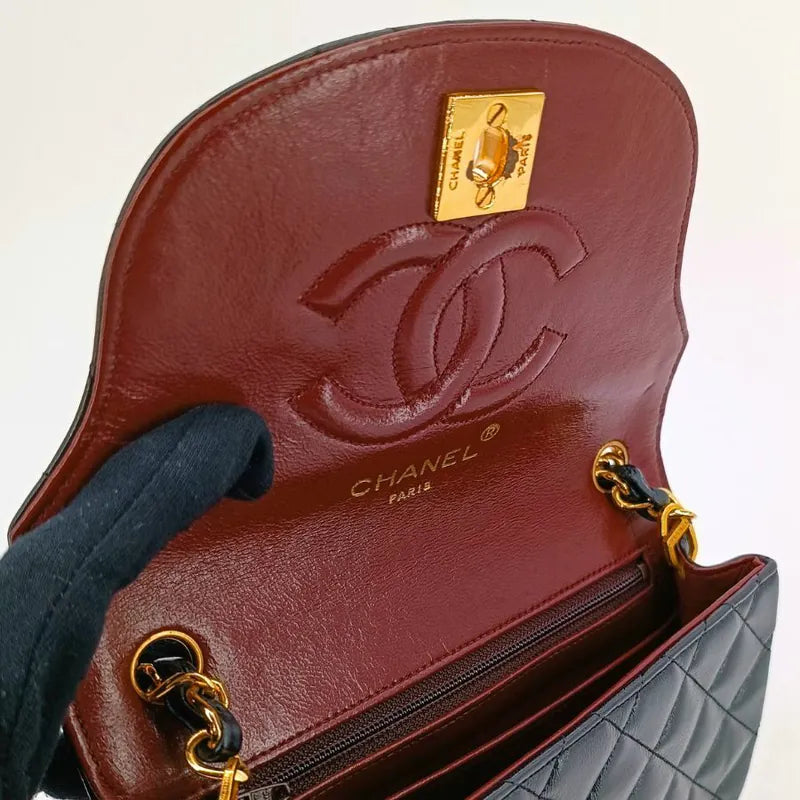 ju431-chanel-vintage-black-lambskin-half-moon-flap-bag