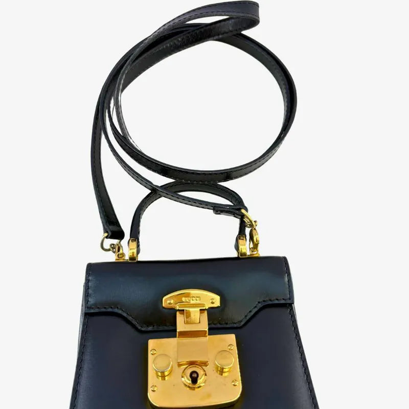 jah209-gucci-vintage-black-leather-kelly-mini-shoulder-bag