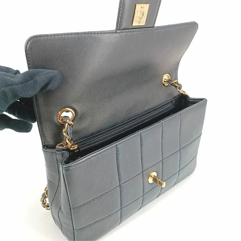 90199599-chanel-vintage-black-lambskin-chocolate-bar-flap-bag