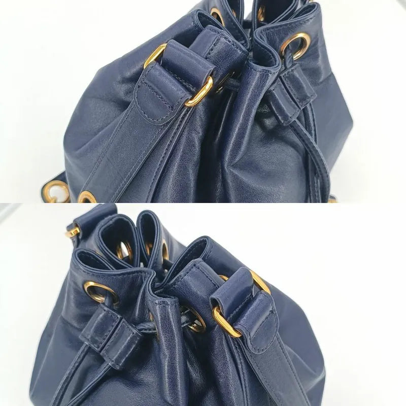 jah154-chanel-vintage-navy-lambskin-gold-ball-bucket-bag