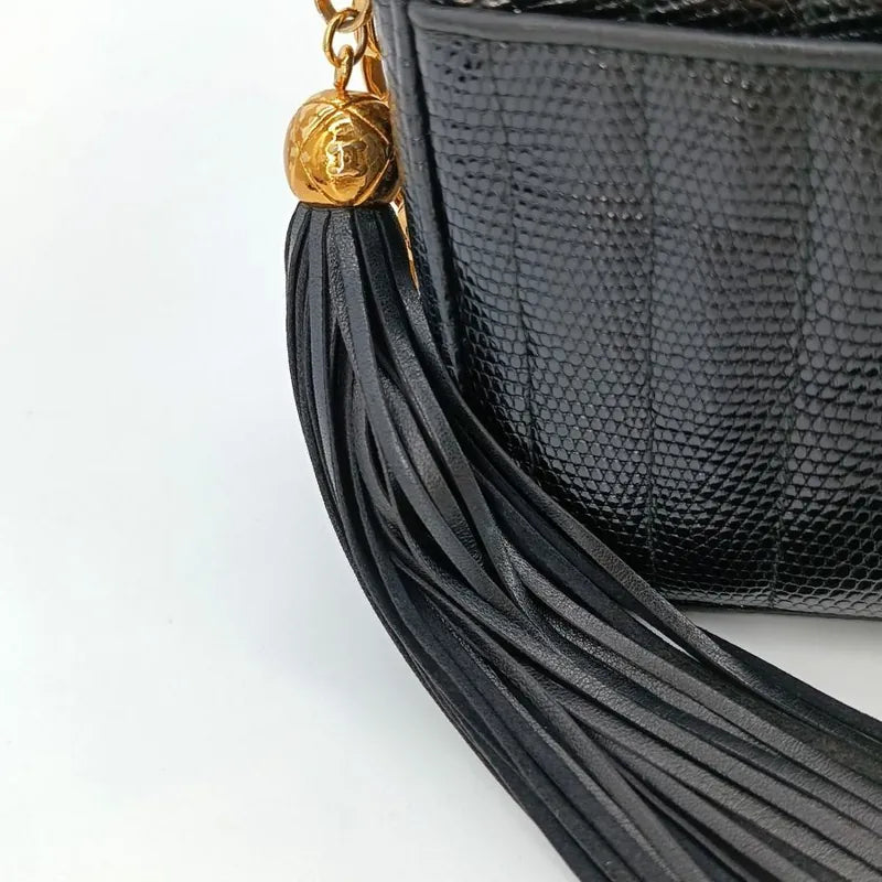 c389-chanel-vintage-black-lizard-skin-tassel-camera-bag