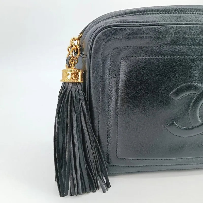 ra469-chanel-vintage-black-lambskin-tassel-camera-bag