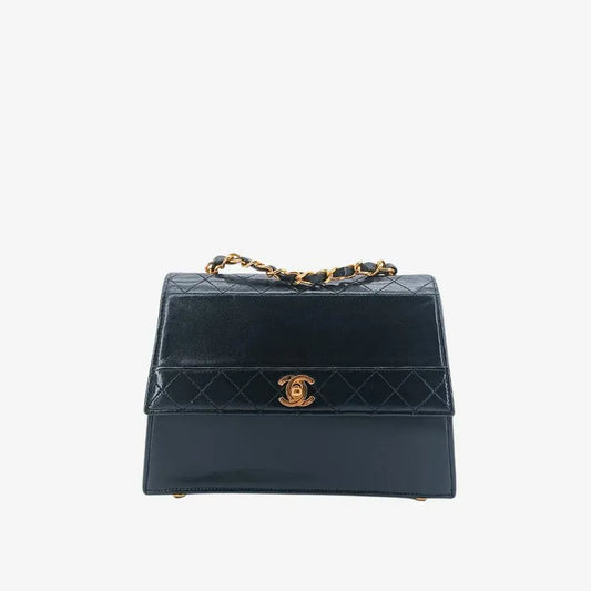 ju308-chanel-vintage-black-lambskin-trapezoid-flap-bag
