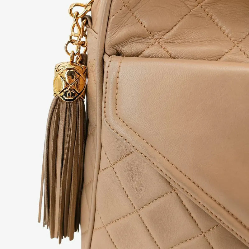 jt786-chanel-vintage-beige-lambskin-tassel-camera-bag