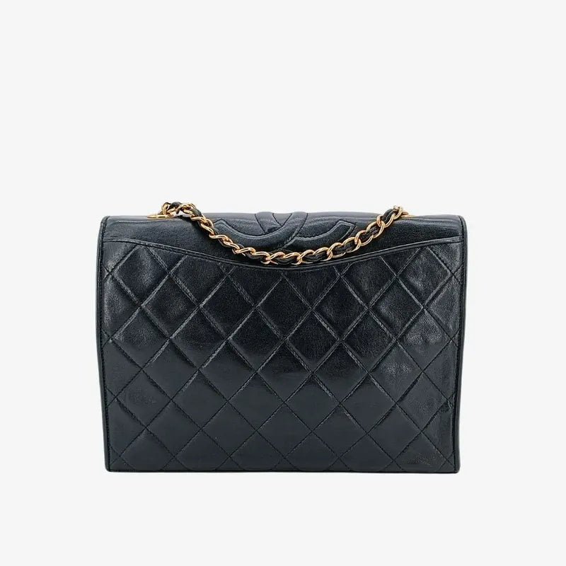 ju424-chanel-vintage-black-lambskin-quilted-flap-bag
