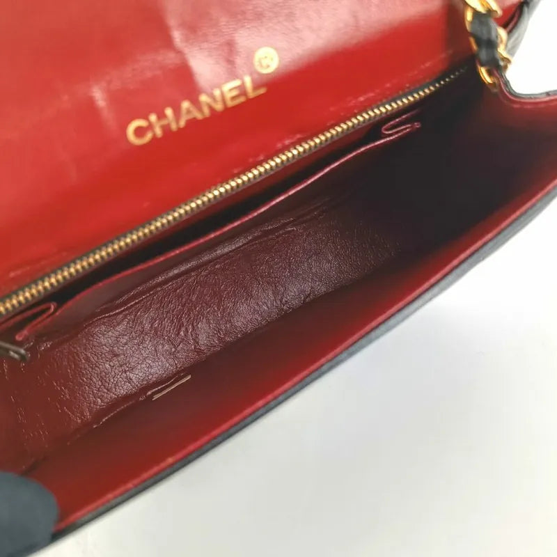 ra355-chanel-vintage-black-lambskin-half-moon-vertical-flap-bag