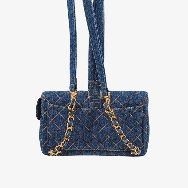 90129699-chanel-vintage-blue-denim-flap-backpack