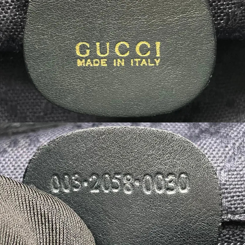 rc147-gucci-vintage-navy-leather-bamboo-backpack