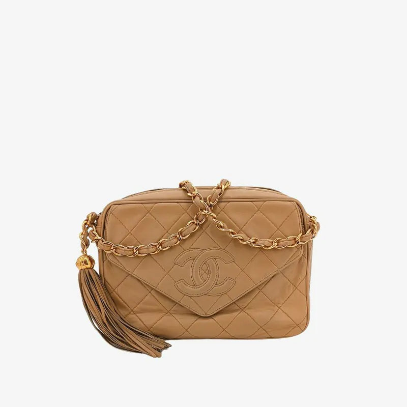 ju350-chanel-vintage-beige-lambskin-tassel-camera-bag