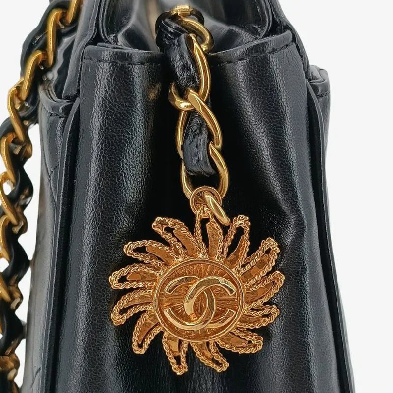 ju709-chanel-vintage-black-lambskin-sun-flower-charm-tote-bag