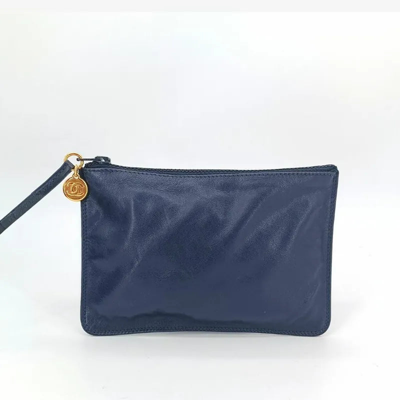 jah154-chanel-vintage-navy-lambskin-gold-ball-bucket-bag