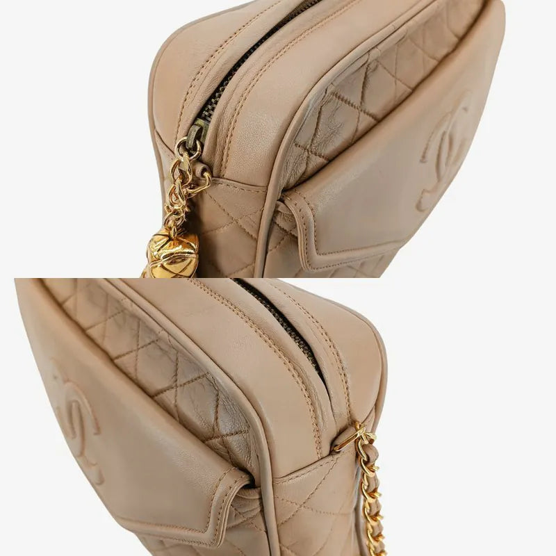 jt786-chanel-vintage-beige-lambskin-tassel-camera-bag