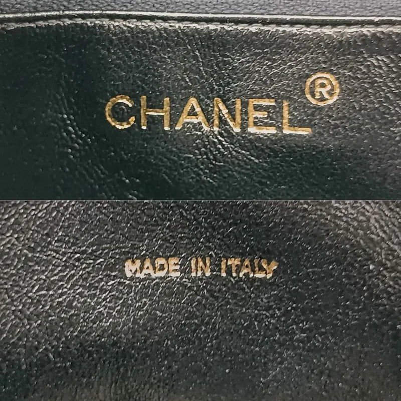 js916-chanel-vintage-black-lambskin-tassel-camera-bag