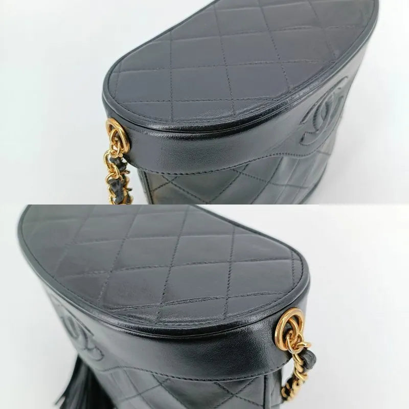 c414-chanel-vintage-black-lambskin-tassels-bucket-bag