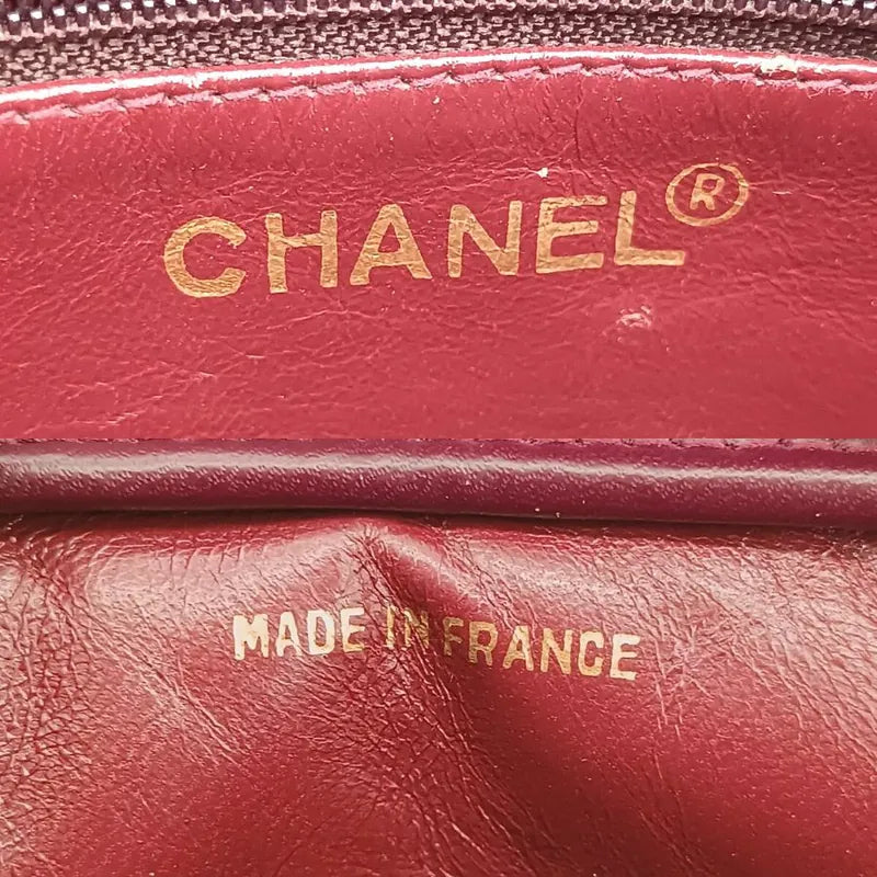 jt057-chanel-vintage-black-lambskin-quilted-camera-bag