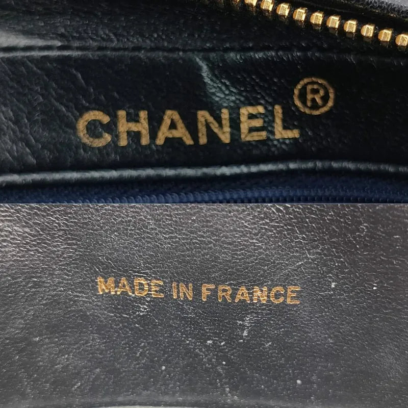 js699-chanel-vintage-navy-lambskin-quilted-camera-bag