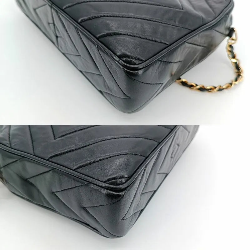 js937-chanel-vintage-black-lambskin-tassel-camera-bag