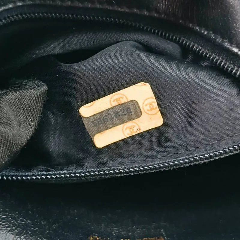 rb495-chanel-vintage-black-lambskin-tassel-camera-bag