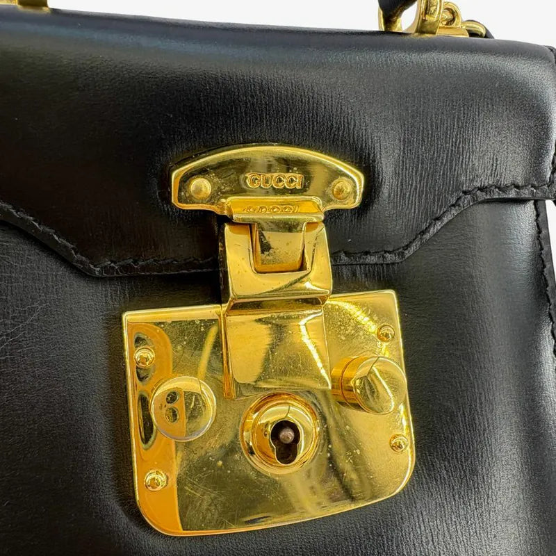 jah209-gucci-vintage-black-leather-kelly-mini-shoulder-bag