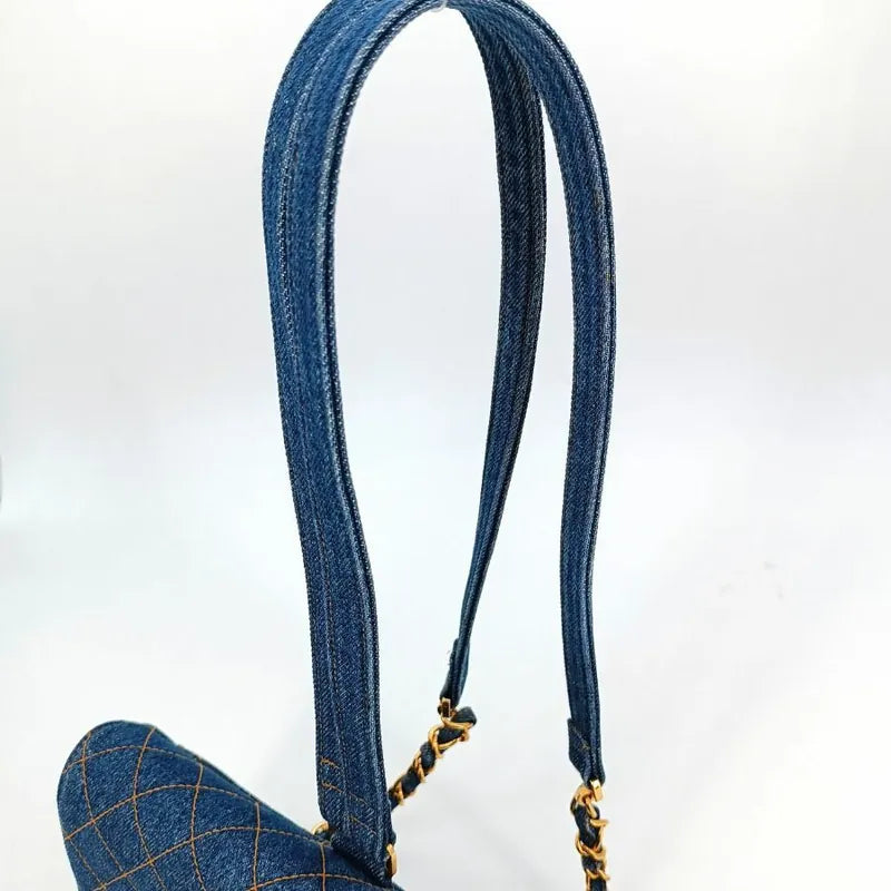 90129699-chanel-vintage-blue-denim-flap-backpack