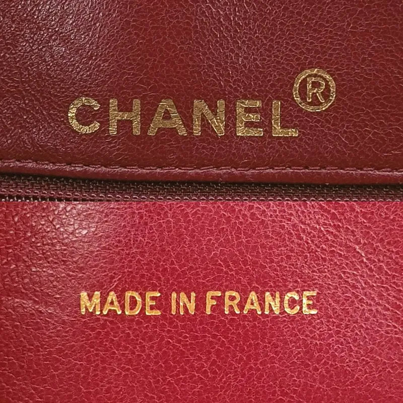 ra426-chanel-vintage-burgundy-lambskin-tessel-camera-bag