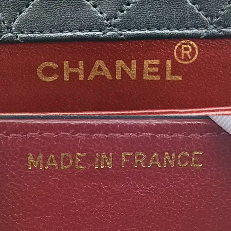 ju308-chanel-vintage-black-lambskin-trapezoid-flap-bag