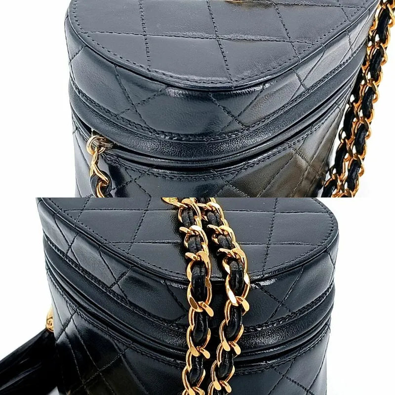 c302-chanel-vintage-black-lambskin-tassel-bucket-bag