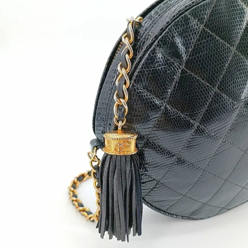 c348-chanel-vintage-black-lizard-skin-round-camera-bag