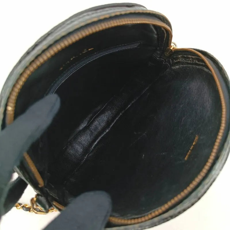 c348-chanel-vintage-black-lizard-skin-round-camera-bag